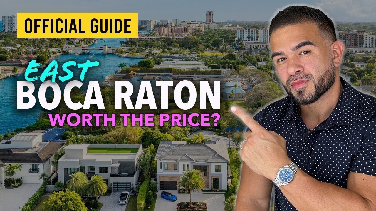 A man is pointing at a house in east boca raton.