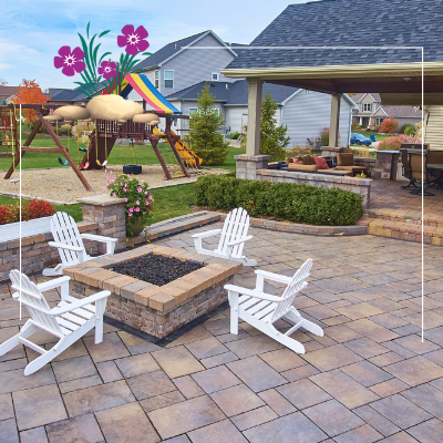 a patio with chairs and a fire pit with a playground in the background