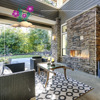 a living room with a fireplace and a rug .
