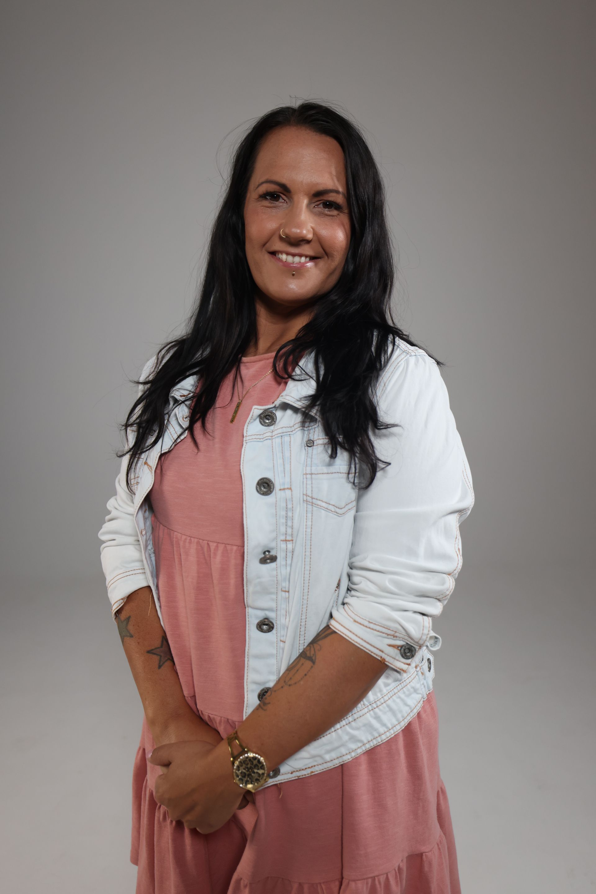 The Woman is Wearing a Pink Dress and a White Denim Jacket —Mind Breath Soul In Byron Bay, NSW