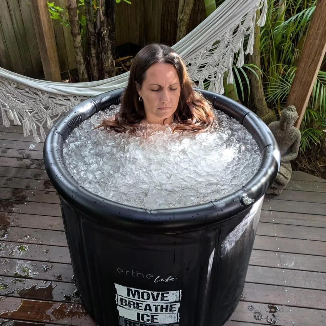 A Woman Is Sitting In A Bucket Of Ice —Mind Breath Soul In Byron Bay, NSW