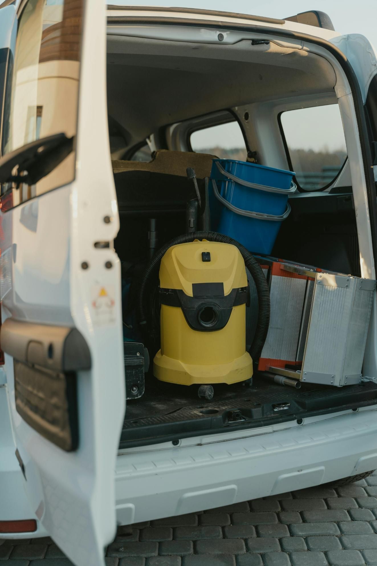A White Van With a Vacuum Cleaner and Buckets in the Back — Alice Springs Carpet Cleaning In Alice Springs, NT