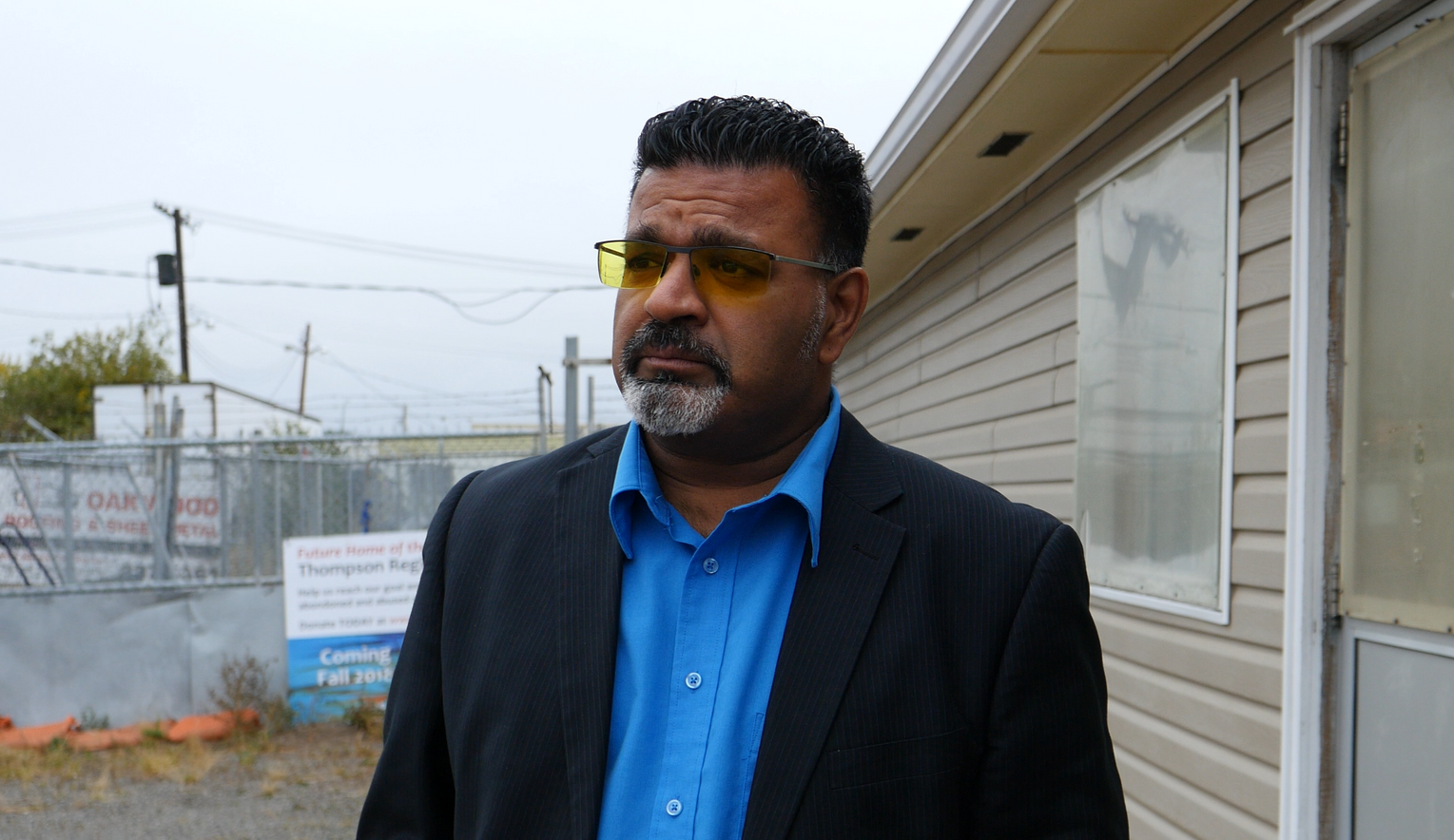 Oswald Sawh standing outside of the Thompson Humane Society