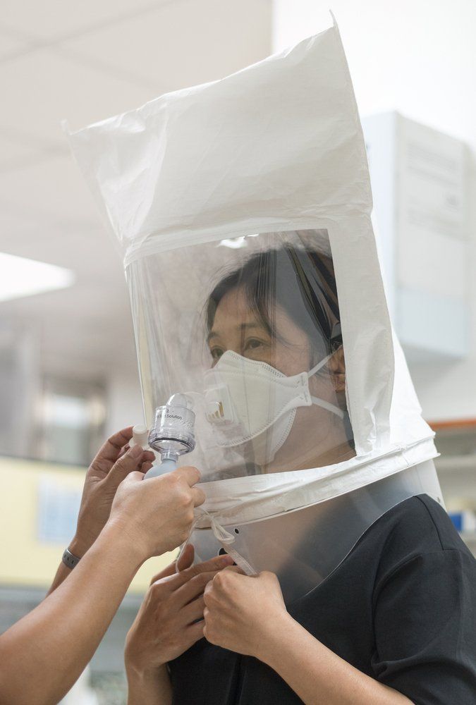 Woman Testing Mask — Enterprise OHS in Aberdare, NSW