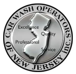 Logo of New Jersey car wash operators. Silver emblem with NJ outline and words: Excellence, Quality, Professional, Service.