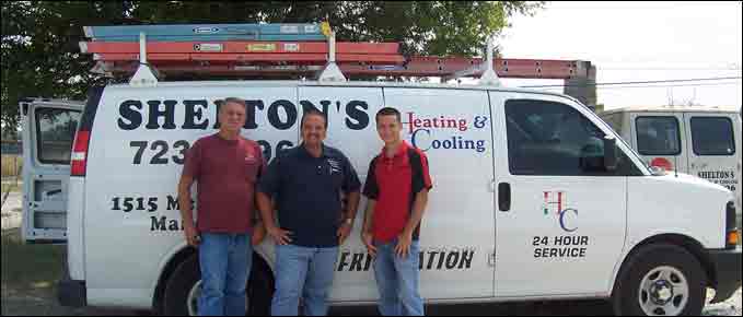 Employees Near Vehicle — Manchester, TN — Shelton's Heating & Cooling
