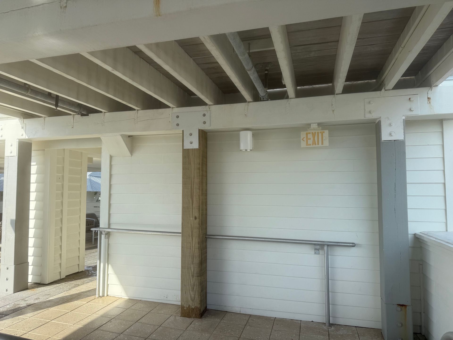 White wooden deck structure with