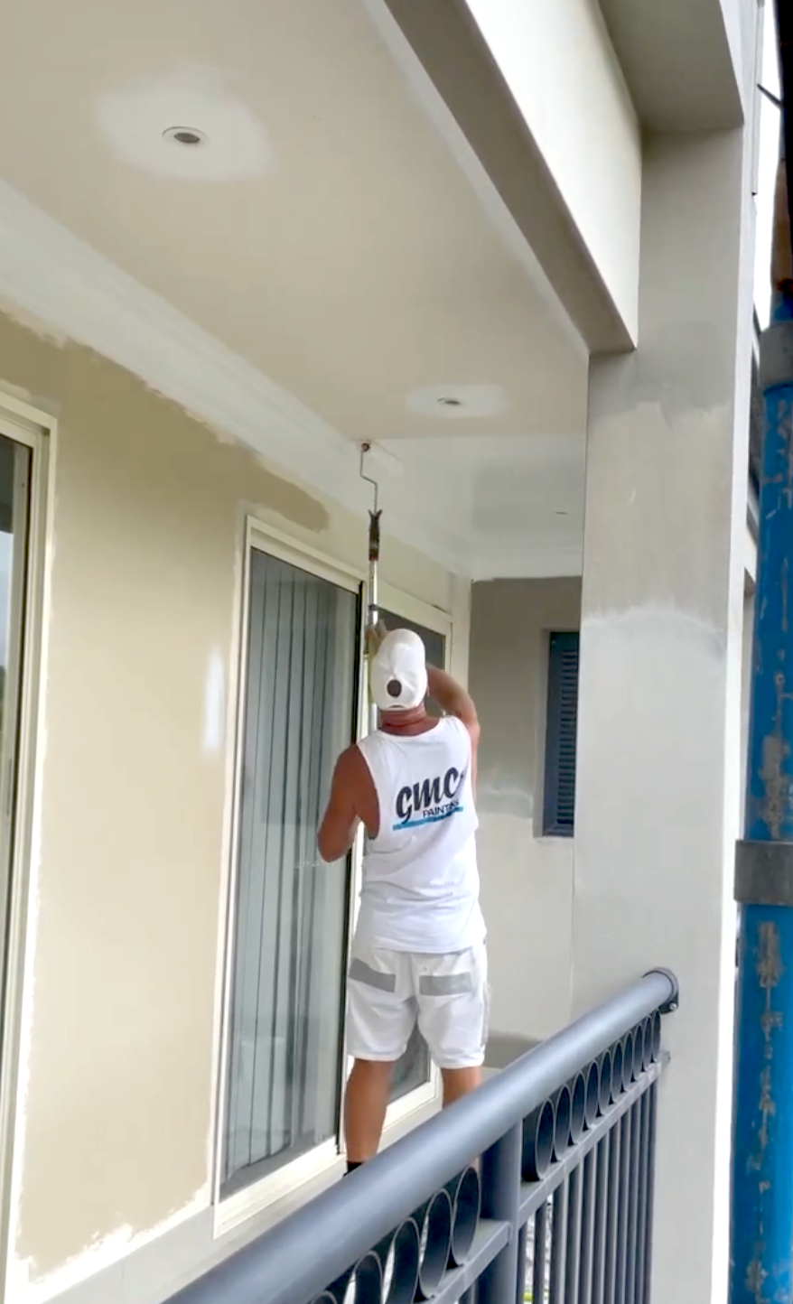 Applying Paint to a roof — Professional Painter on the Gold Coast, QLD