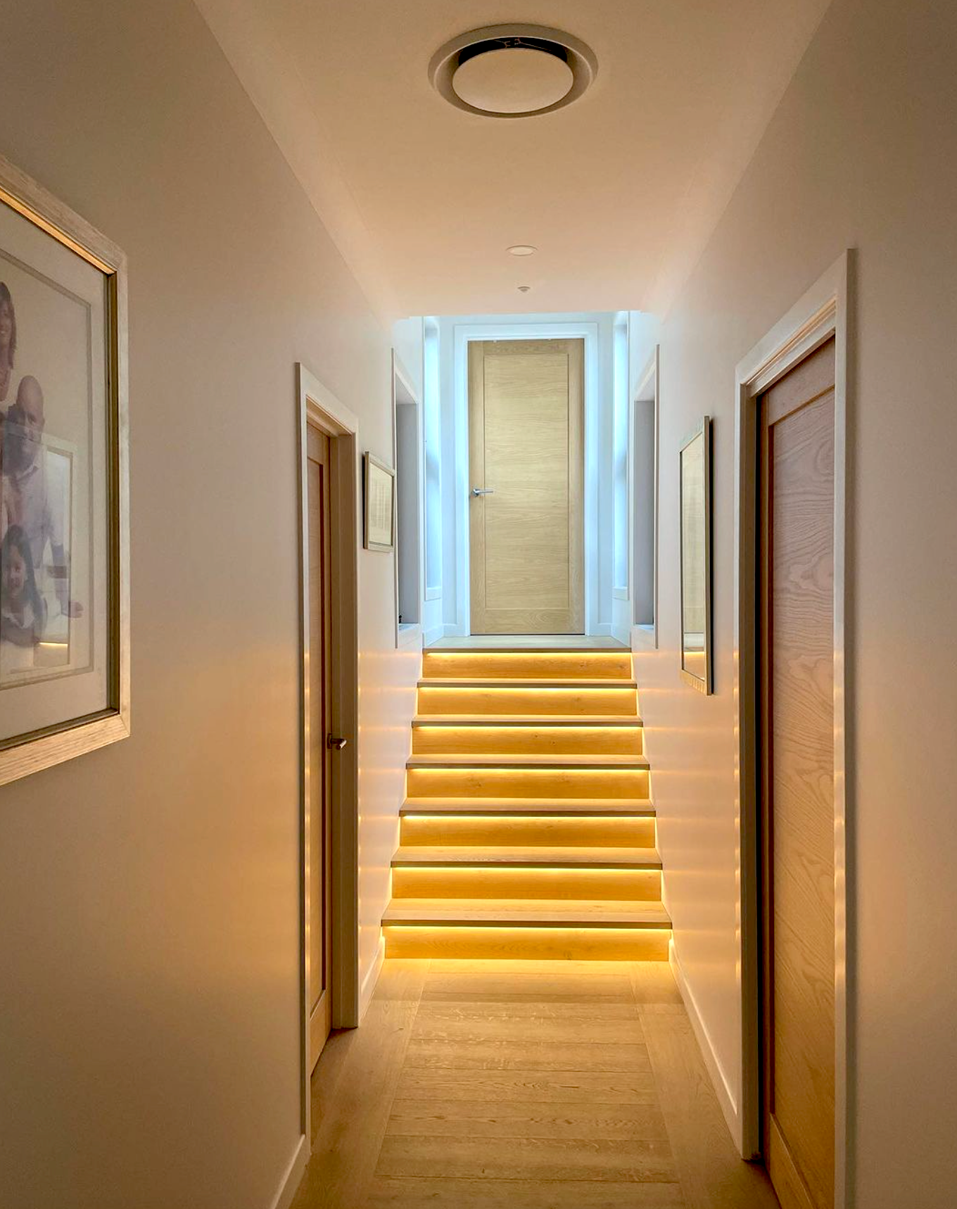 Newly paint hallway lit up with yellow lights— Professional Painter on the Gold Coast, QLD