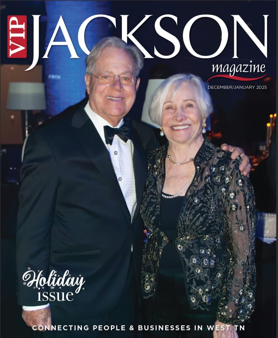 VIP Jackson magazine cover: smiling couple, man in tux, woman in sequined jacket, holiday issue.