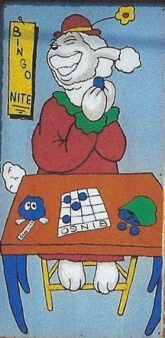A cartoon rabbit is sitting at a table playing bingo