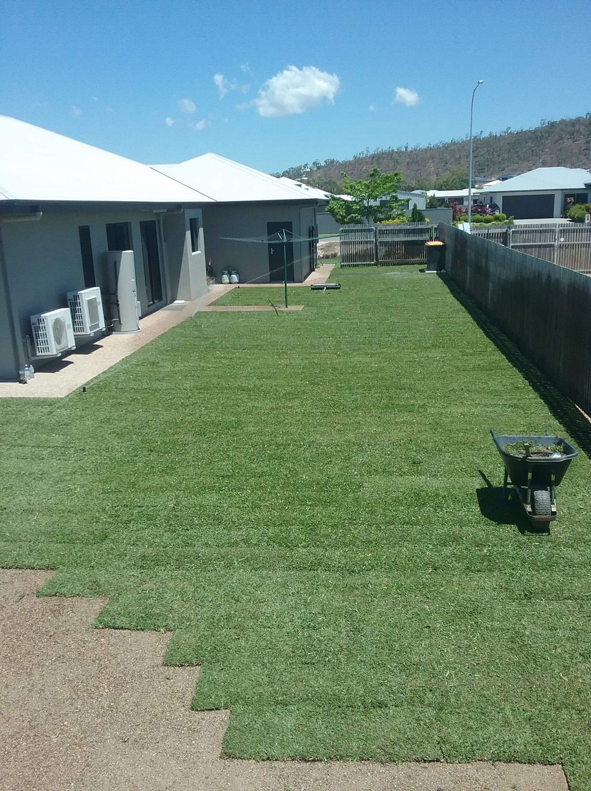 Installing Turf In Backyard — Turf in North Queensland, QLD