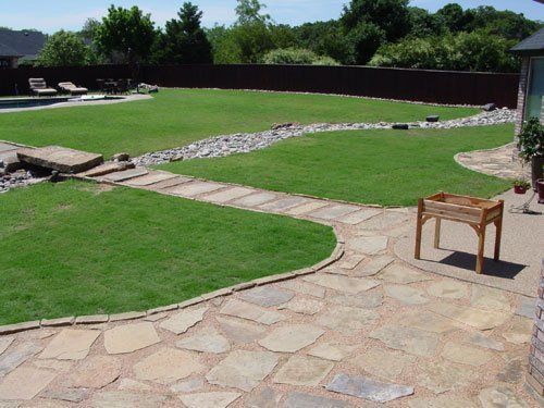 Concrete Pave with Table — Arlington, TX — The Lawn Brigade