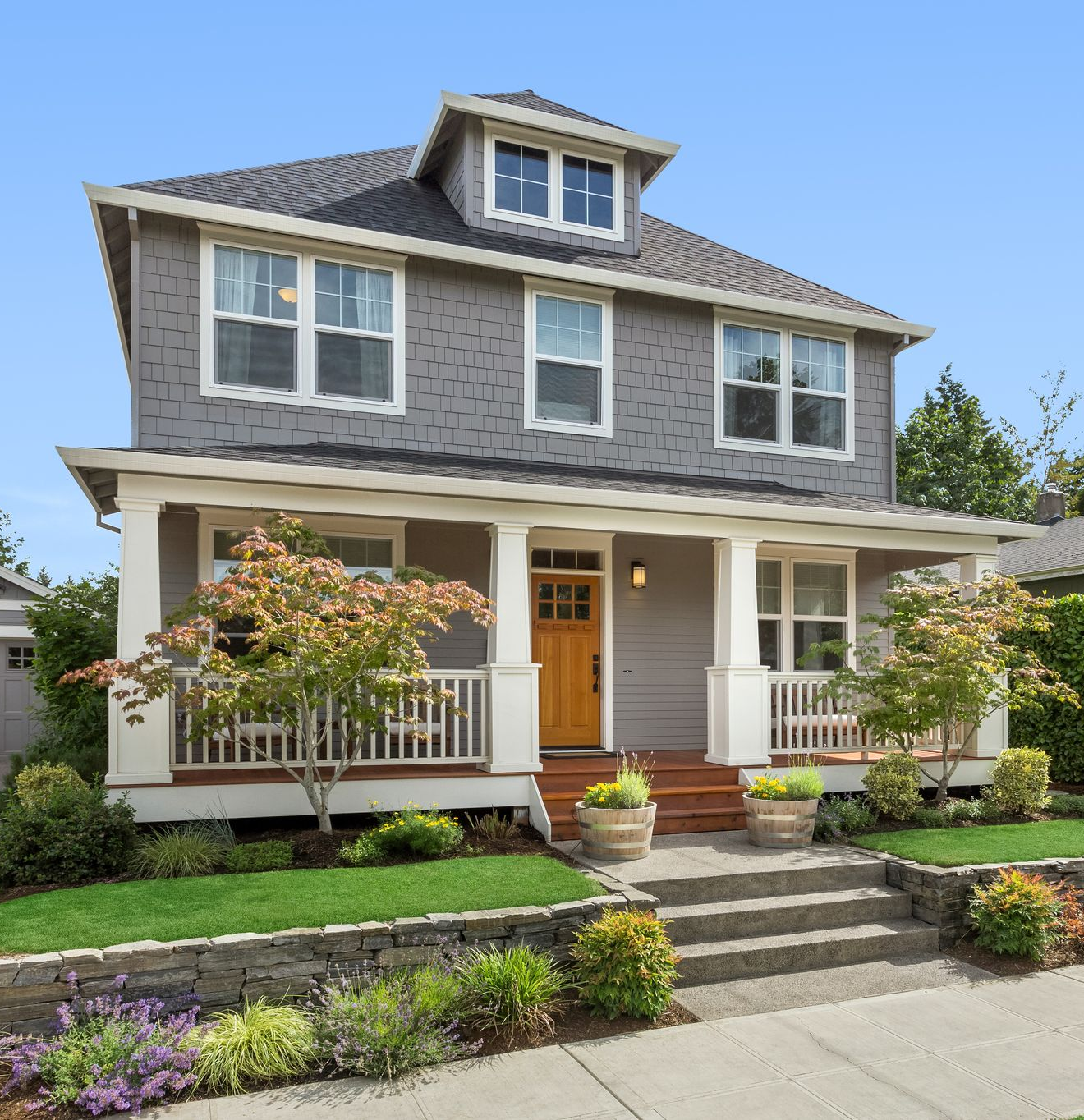 Residential yard with fresh landscaping and garden work.