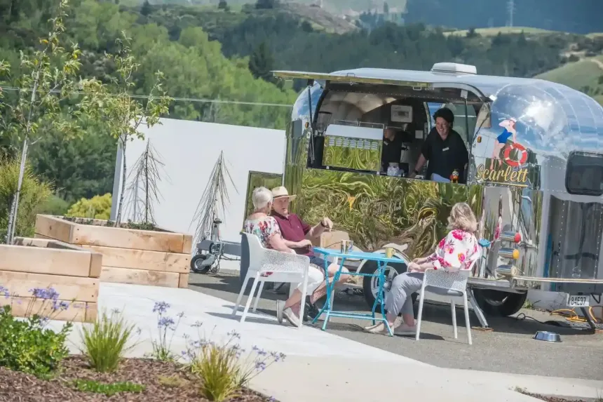 Residents enjoying coffee at outdoor café