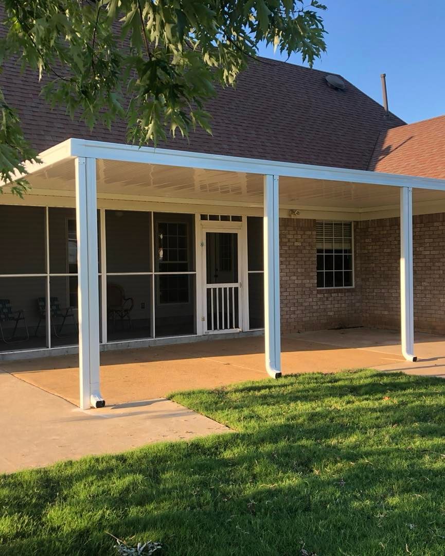 A house with a porch and a lot of windows