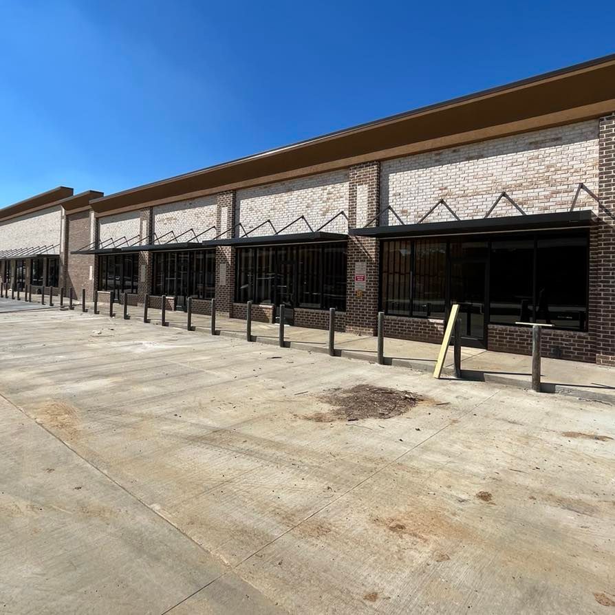 A large brick building with a lot of windows