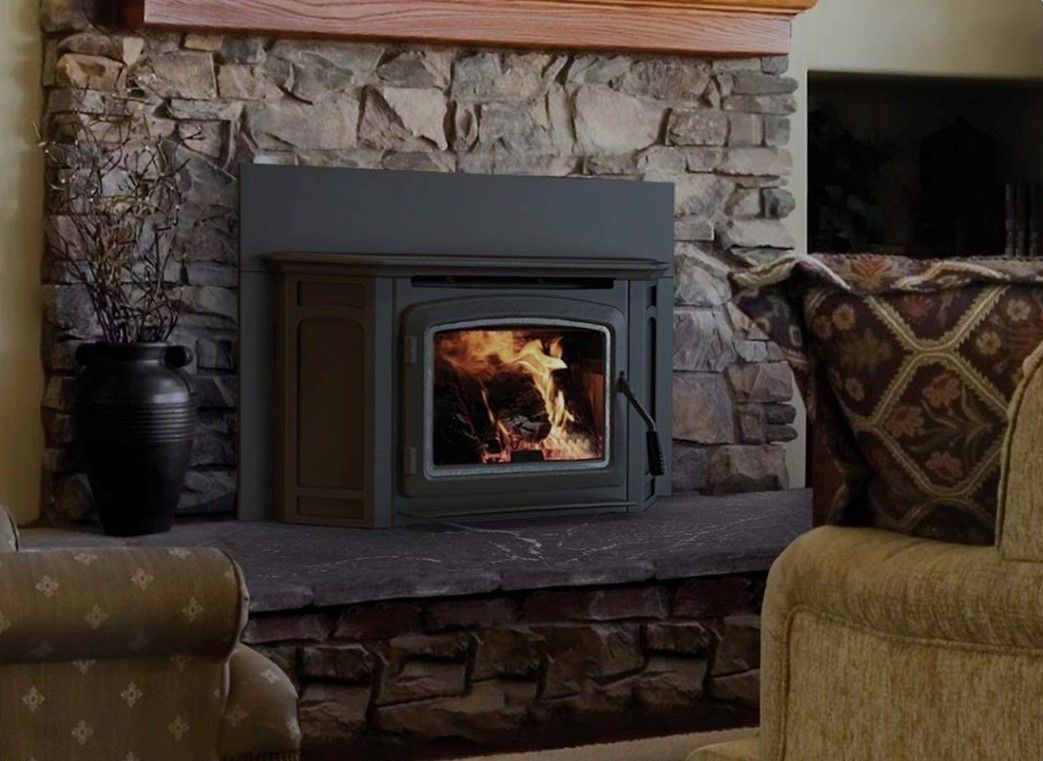 A living room with a fireplace and a chair.