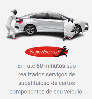 Dois funcionários realizando a manutenção de um carro prata; logotipo