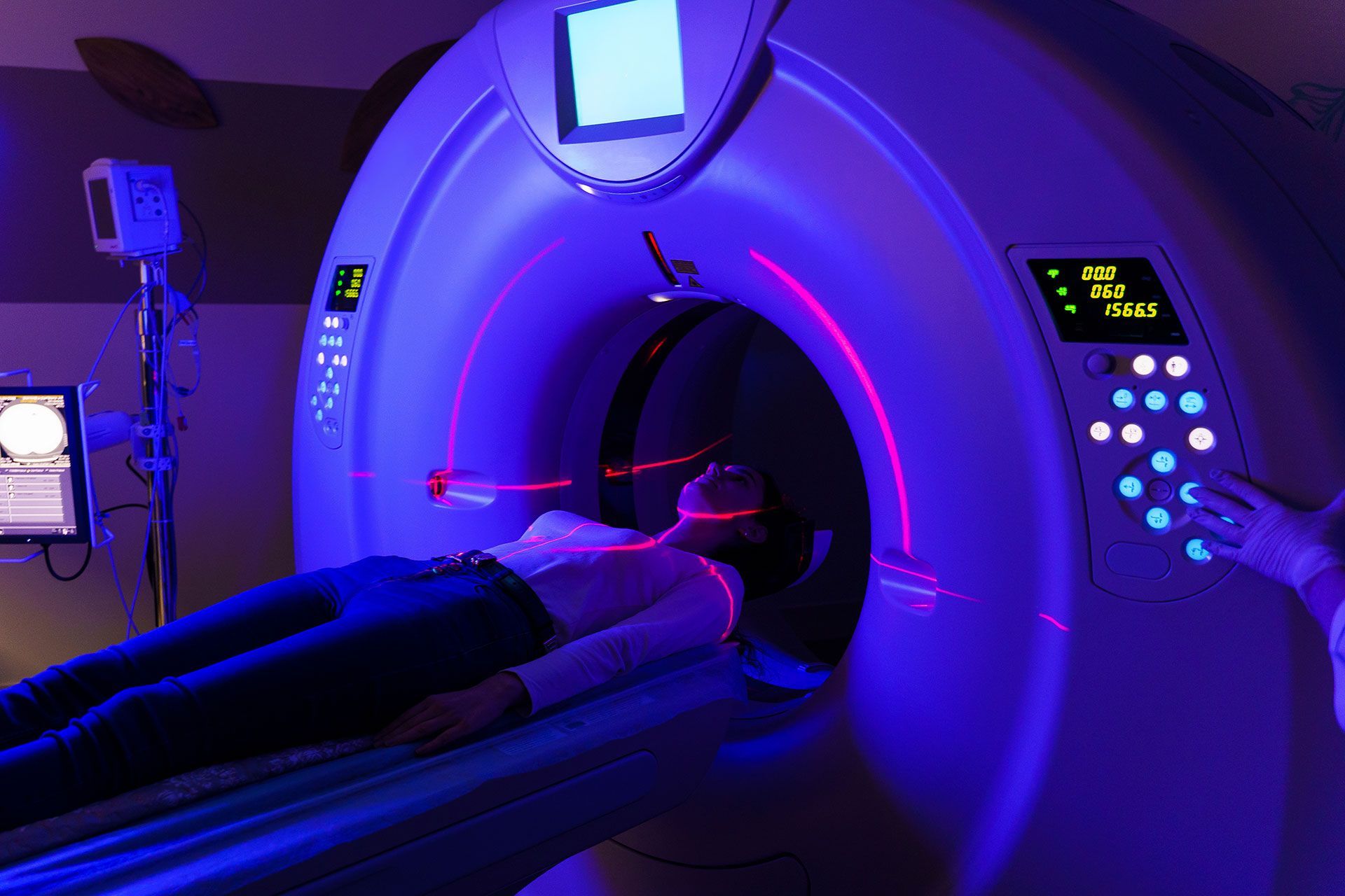 A woman is getting a ct scan in a hospital