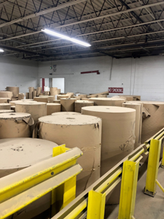 A Warehouse Filled With Rolls Of Cardboard Paper | Chicago, IL | Mid America Paper Recycling Co Inc
