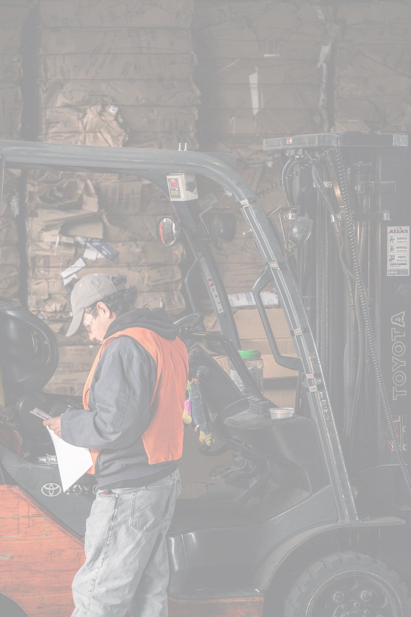 Man Working On Recycling — Chicago, IL — Mid America Paper Recycling Co Inc