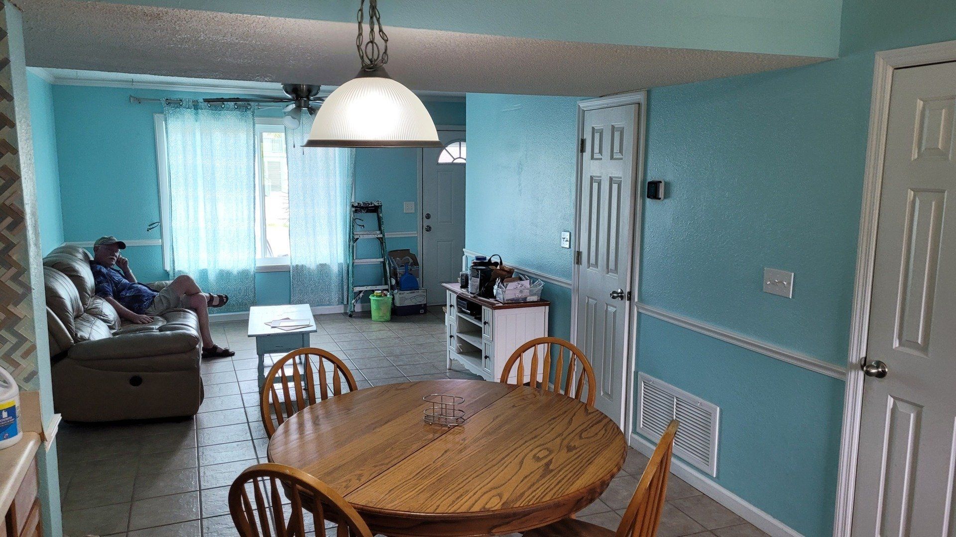 kitchen with blue walls before KCG renovations