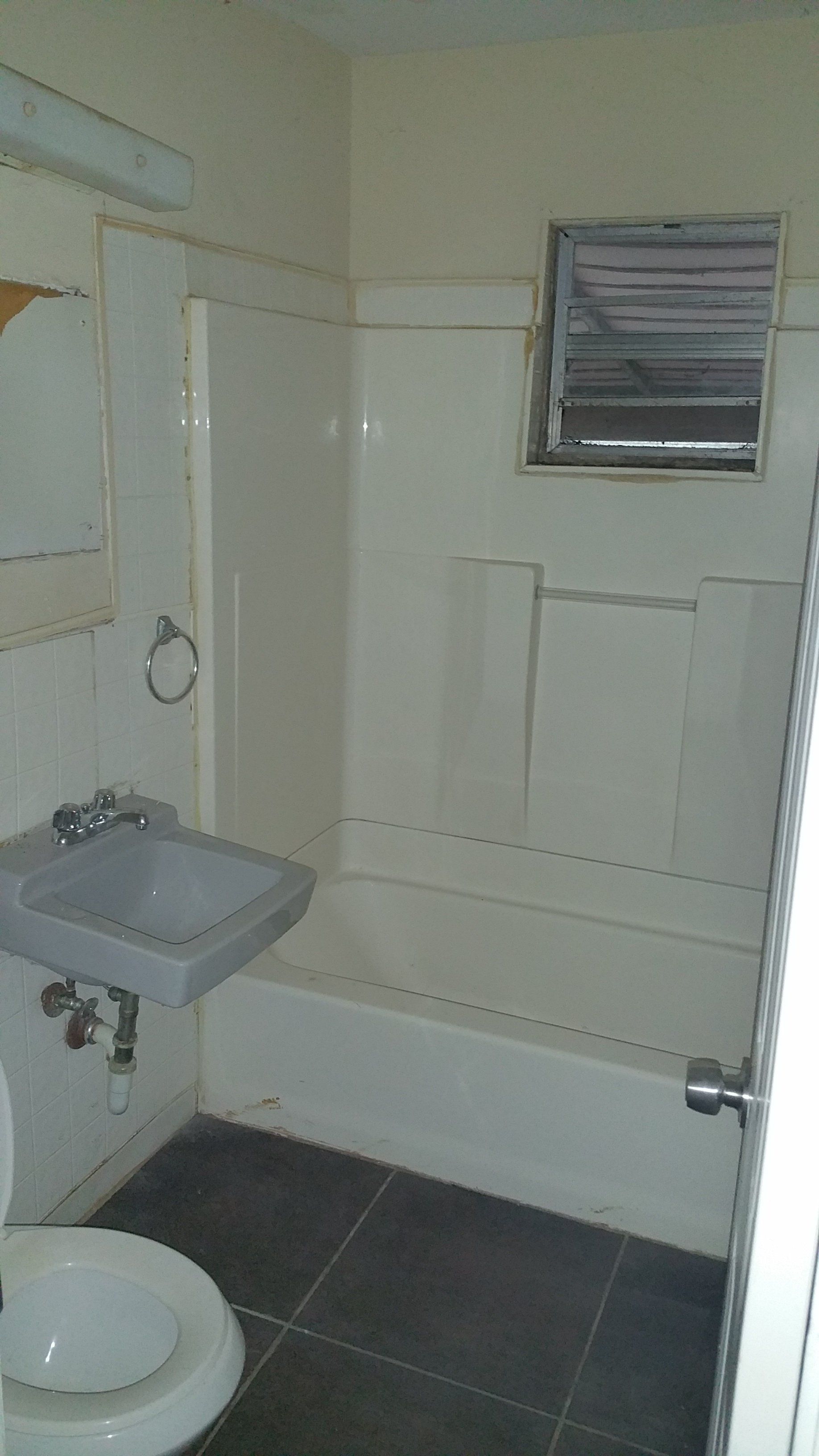 bathroom before KCG maintenance and renovations