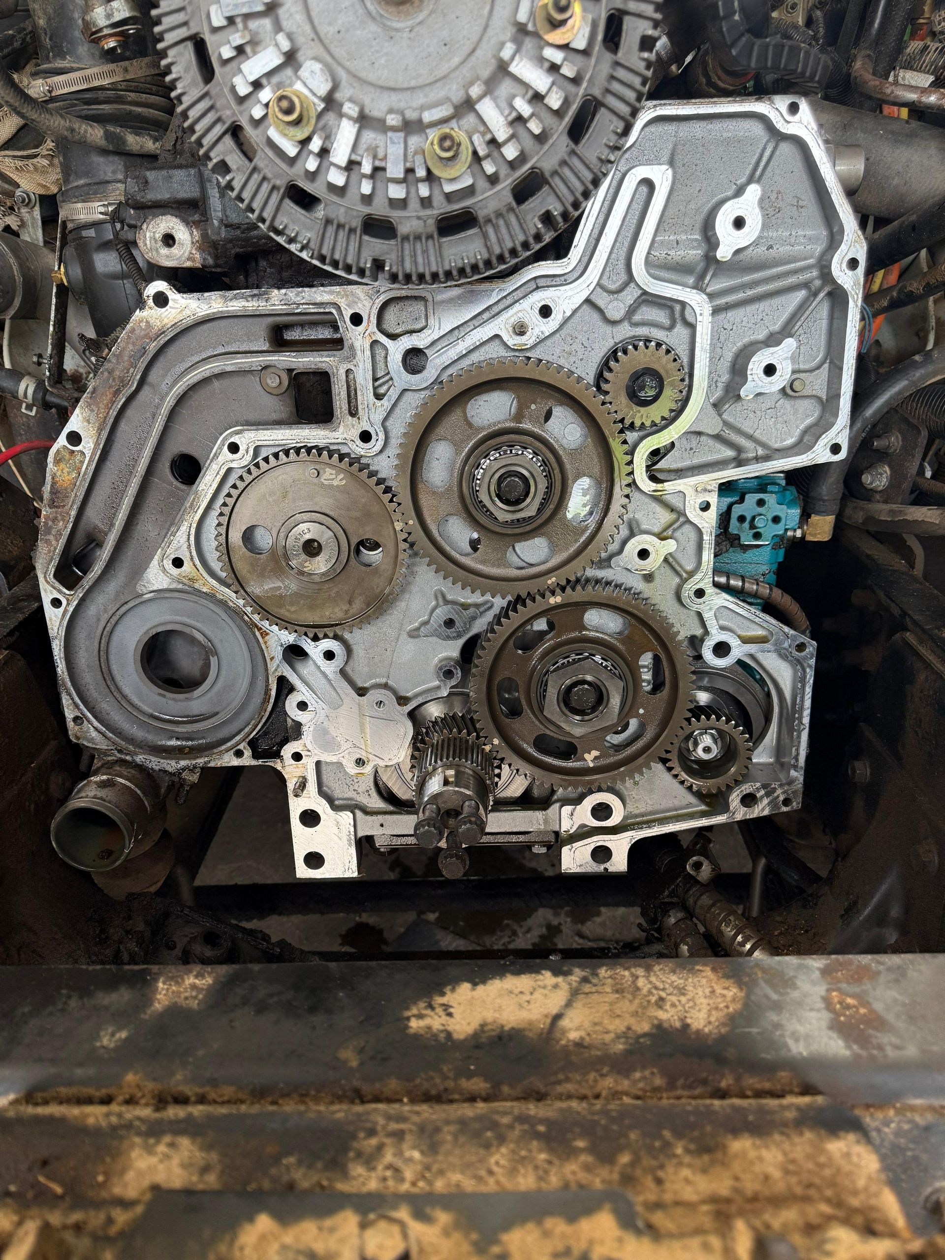 Internal engine parts: gears, timing chain, and associated components.