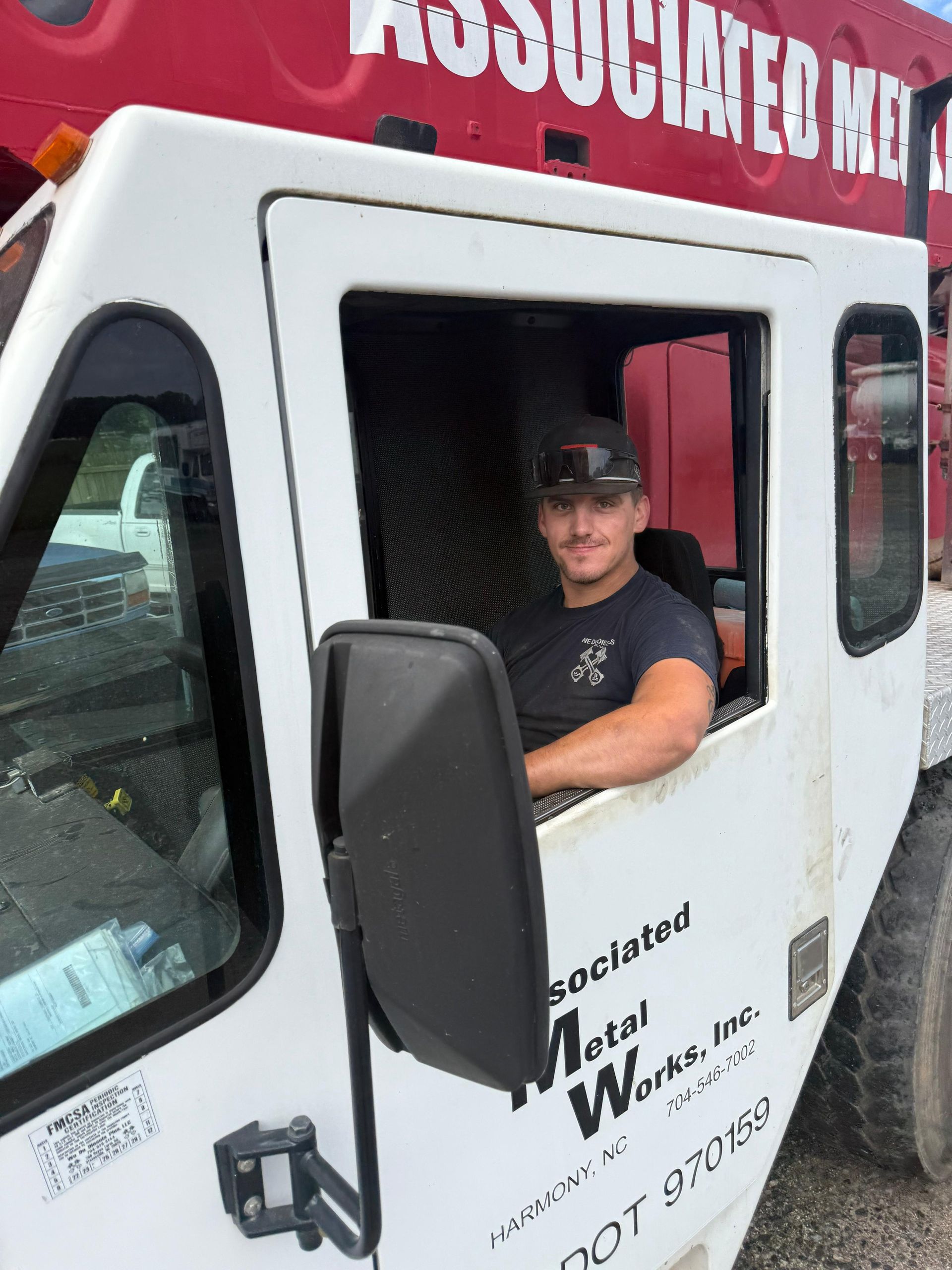 Man in a truck cab of 