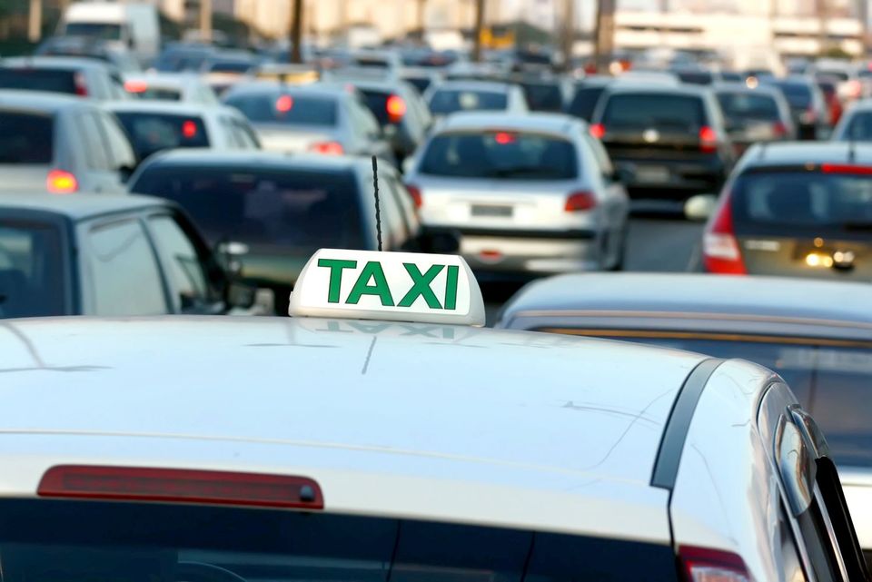 Cab with convenient airport taxi rate among cars in Monroe, NY