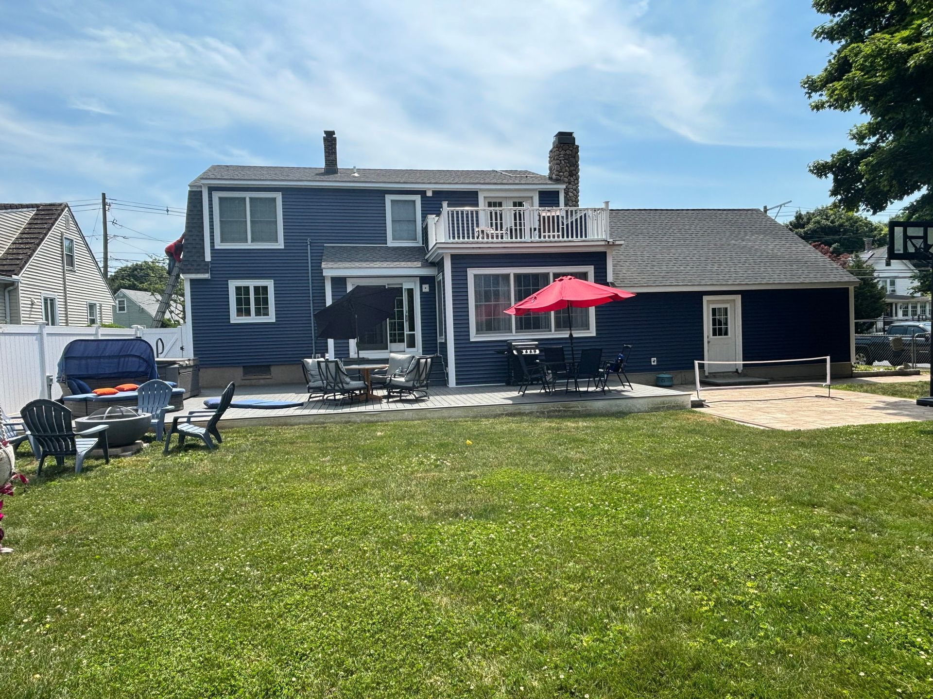 A large house with a large lawn in front of it