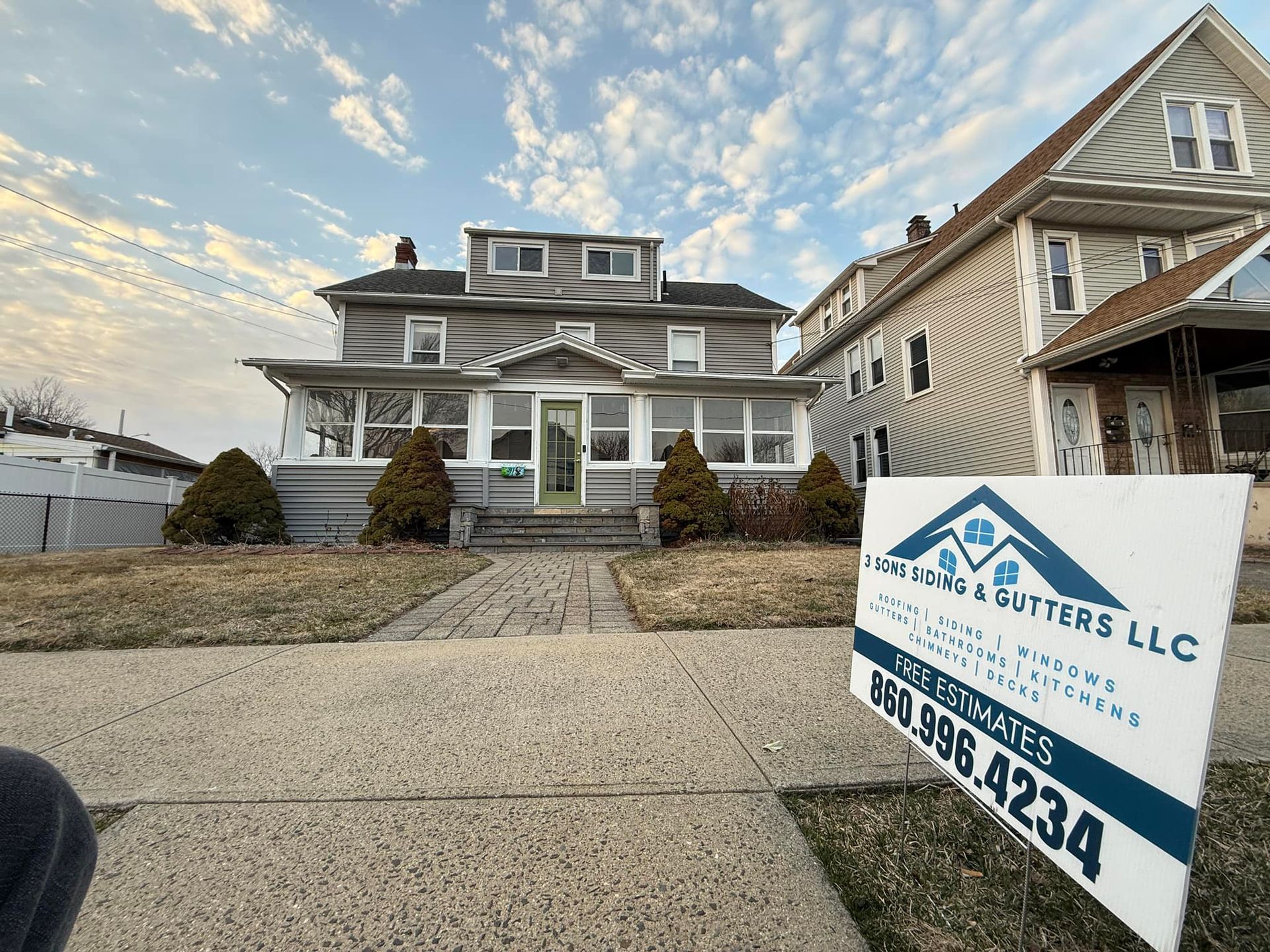 House with a sign for 