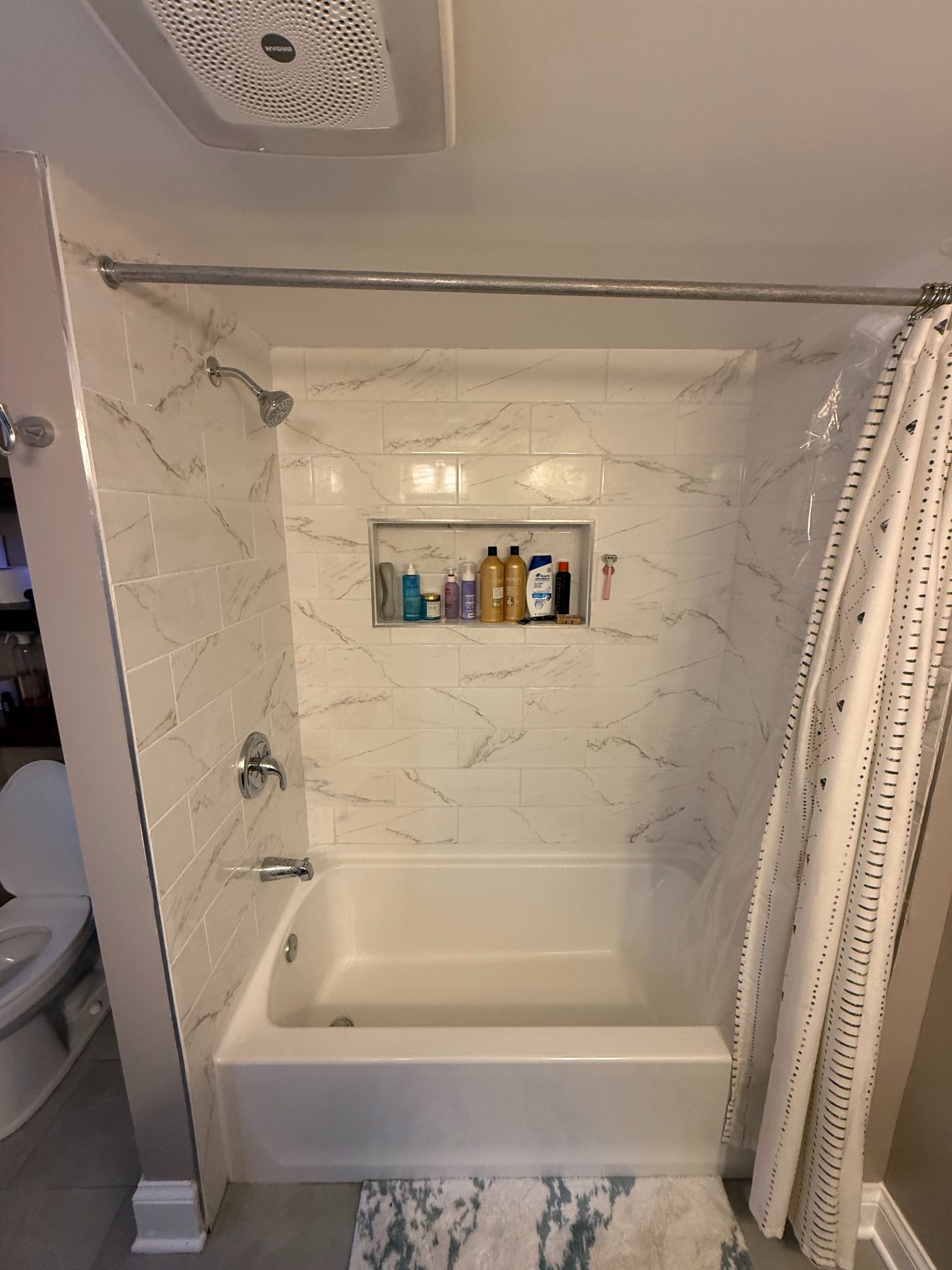 An aerial view of a large wave in the ocean.