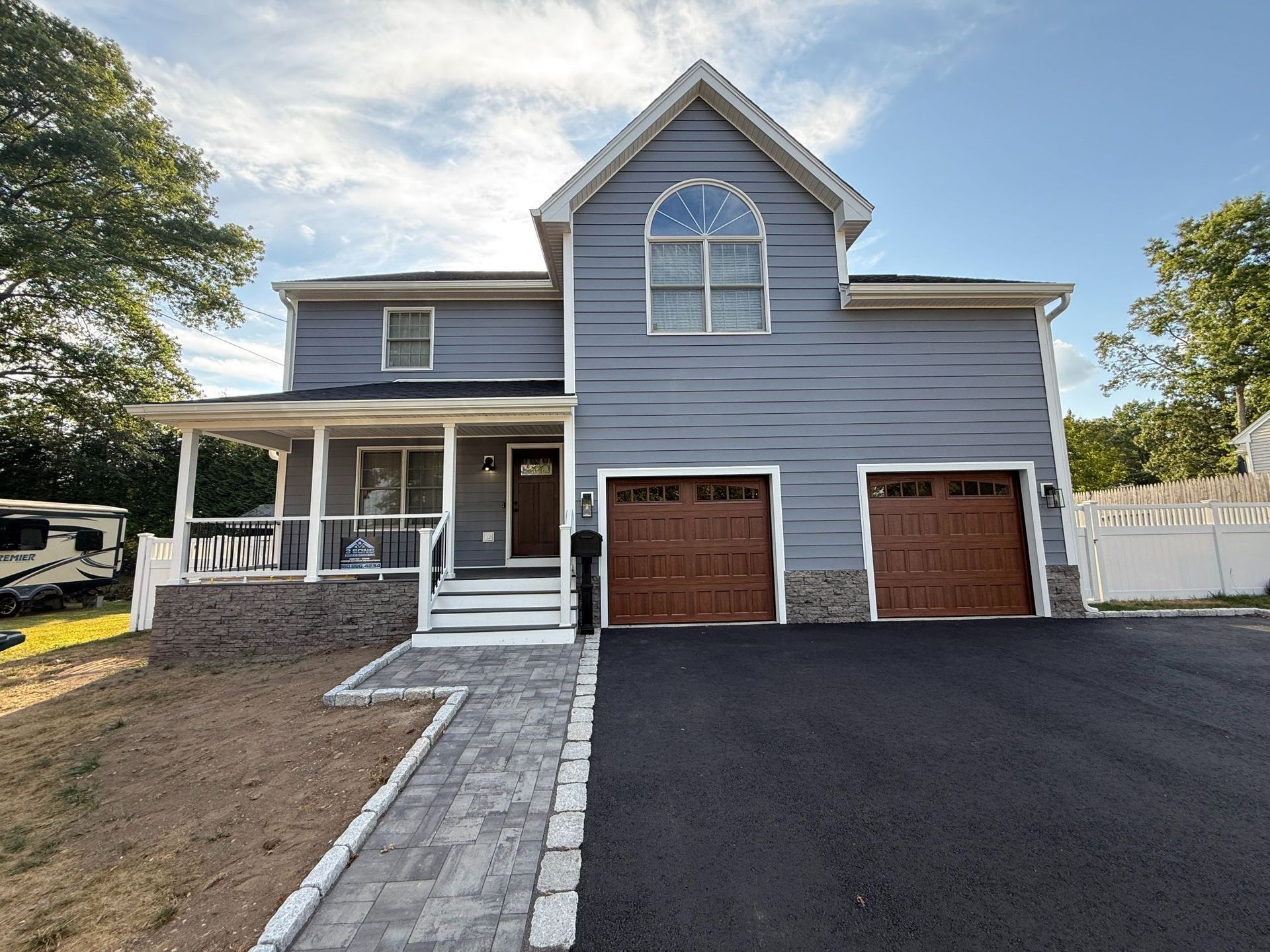 An aerial view of a large wave in the ocean.