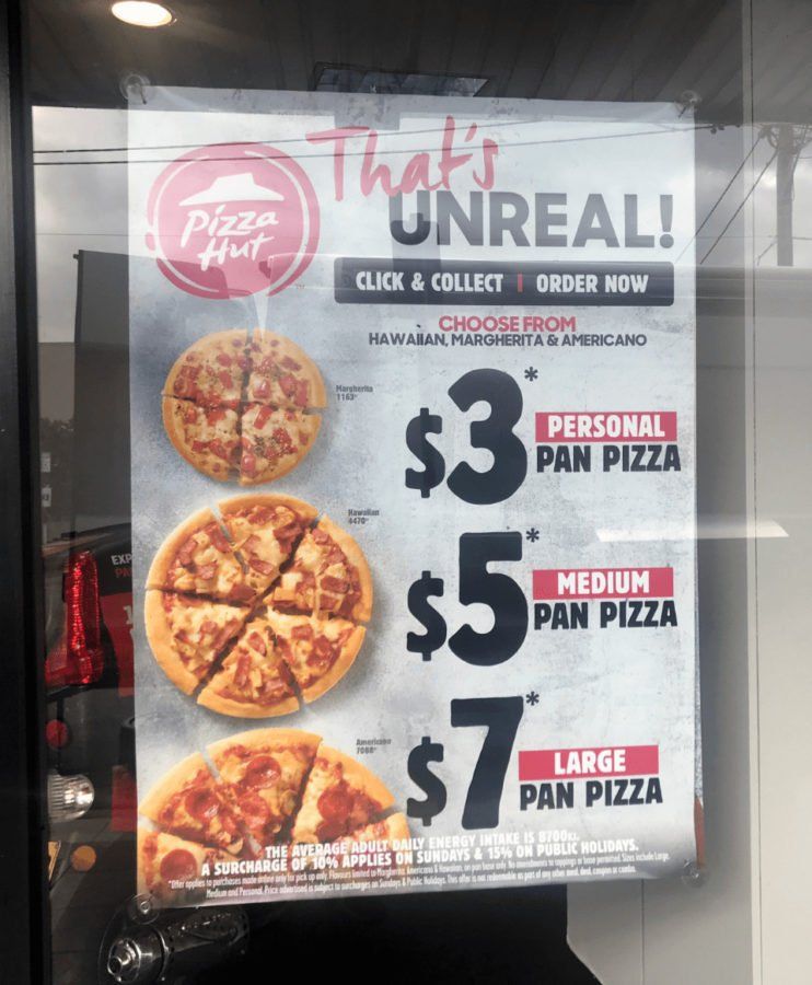 That's unreal Pizza Hut advert in a store window