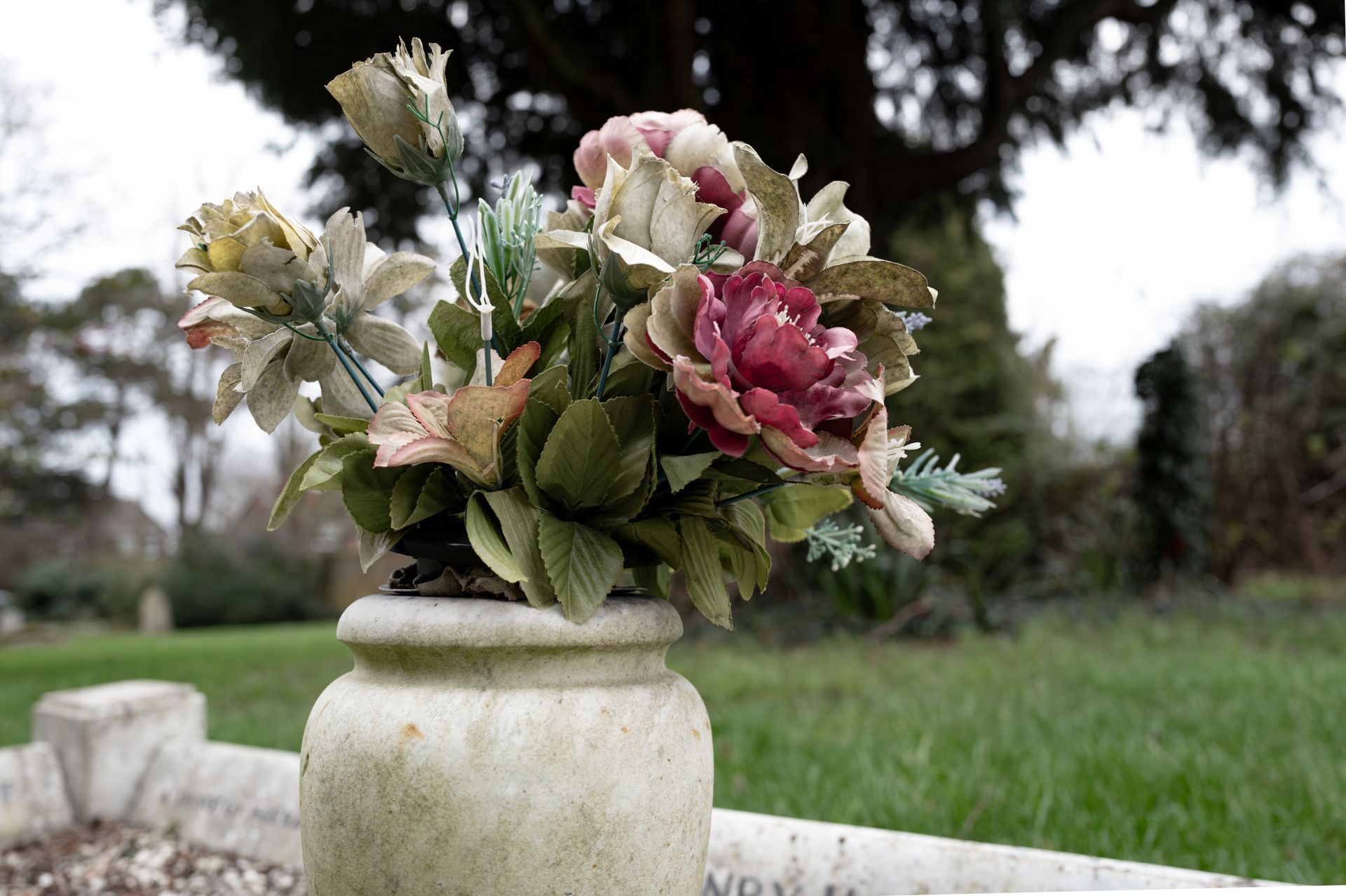 White urn with flowers