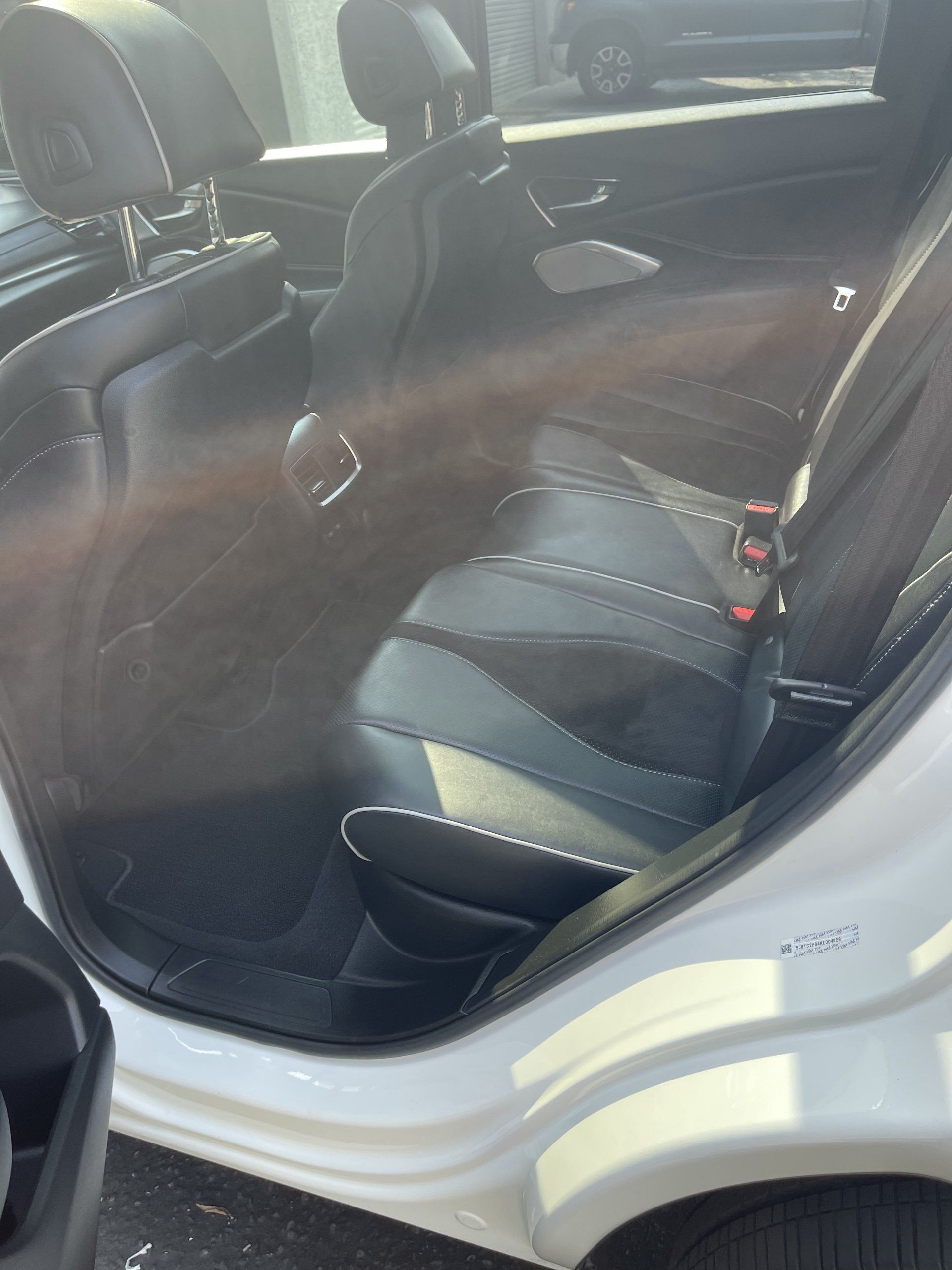Fresno Auto Detailing - White SUV Backseats