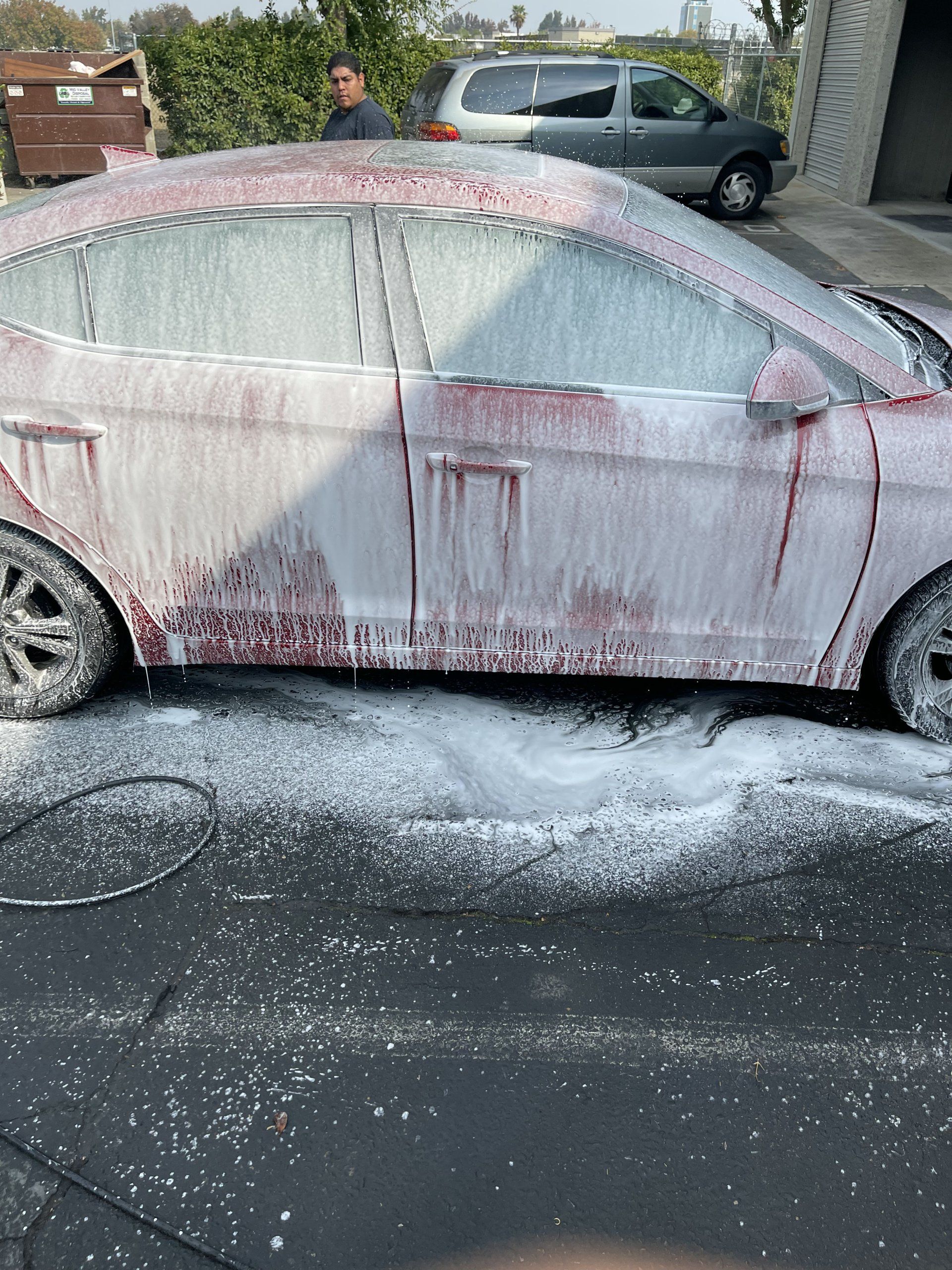 Fresno Auto Detailing - Red Car Sprayed with Cleaning Foam