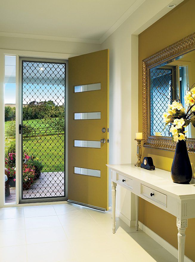 A Hallway With A Yellow Door And A Mirror — Eastcoast Aluminium & Glass In Ballina, NSW