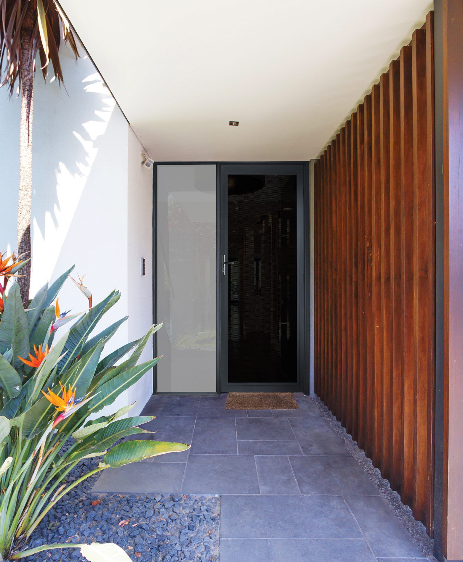 A Hallway With A Door And A Plant In The Foreground — Eastcoast Aluminium & Glass In Ballina, NSW