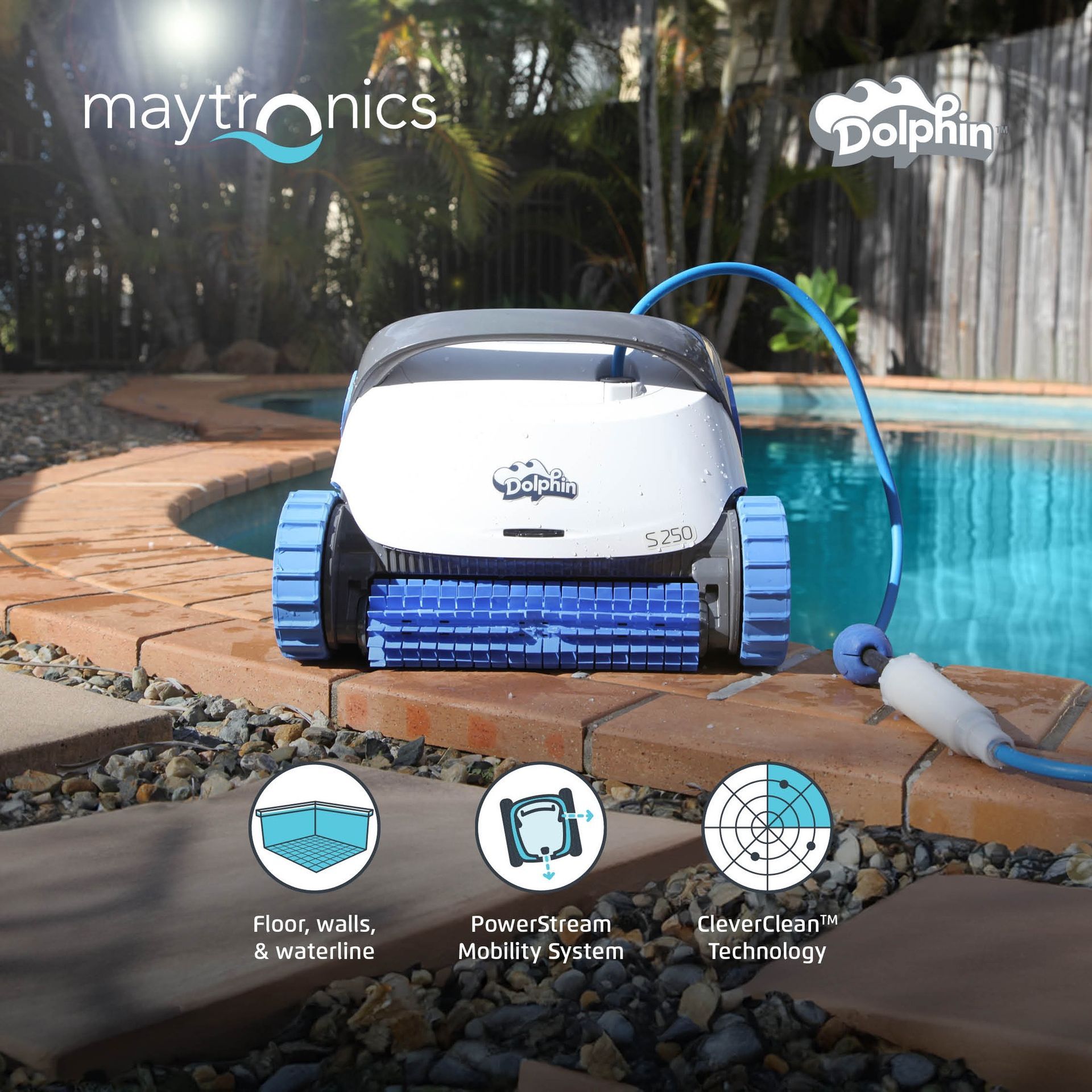 A Maytronics Dolphin Pool Cleaner With Blue Treads, Cleaning a Pool — Manning Pools, Rubber & Foam In Wingham, NSW
