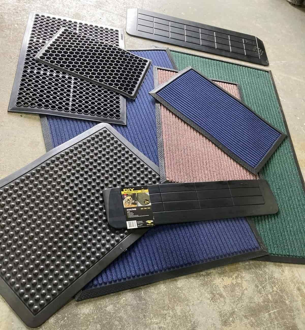 A Bunch Of Mats Are Sitting On Top Of Each Other On A Table — Manning Pools, Rubber & Foam In Taree, NSW