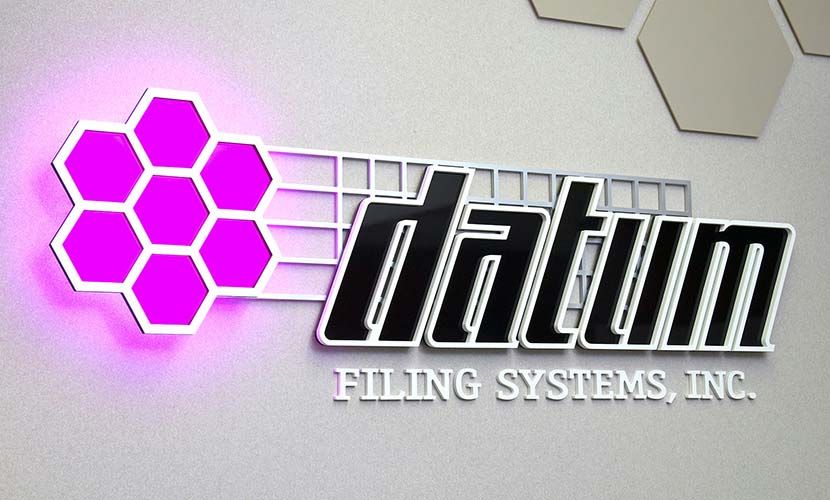 A sign that says datum filling systems inc. on it