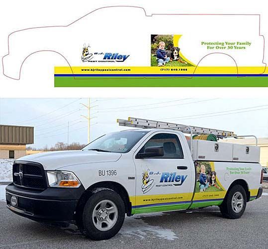 A white truck with the word riley on the side