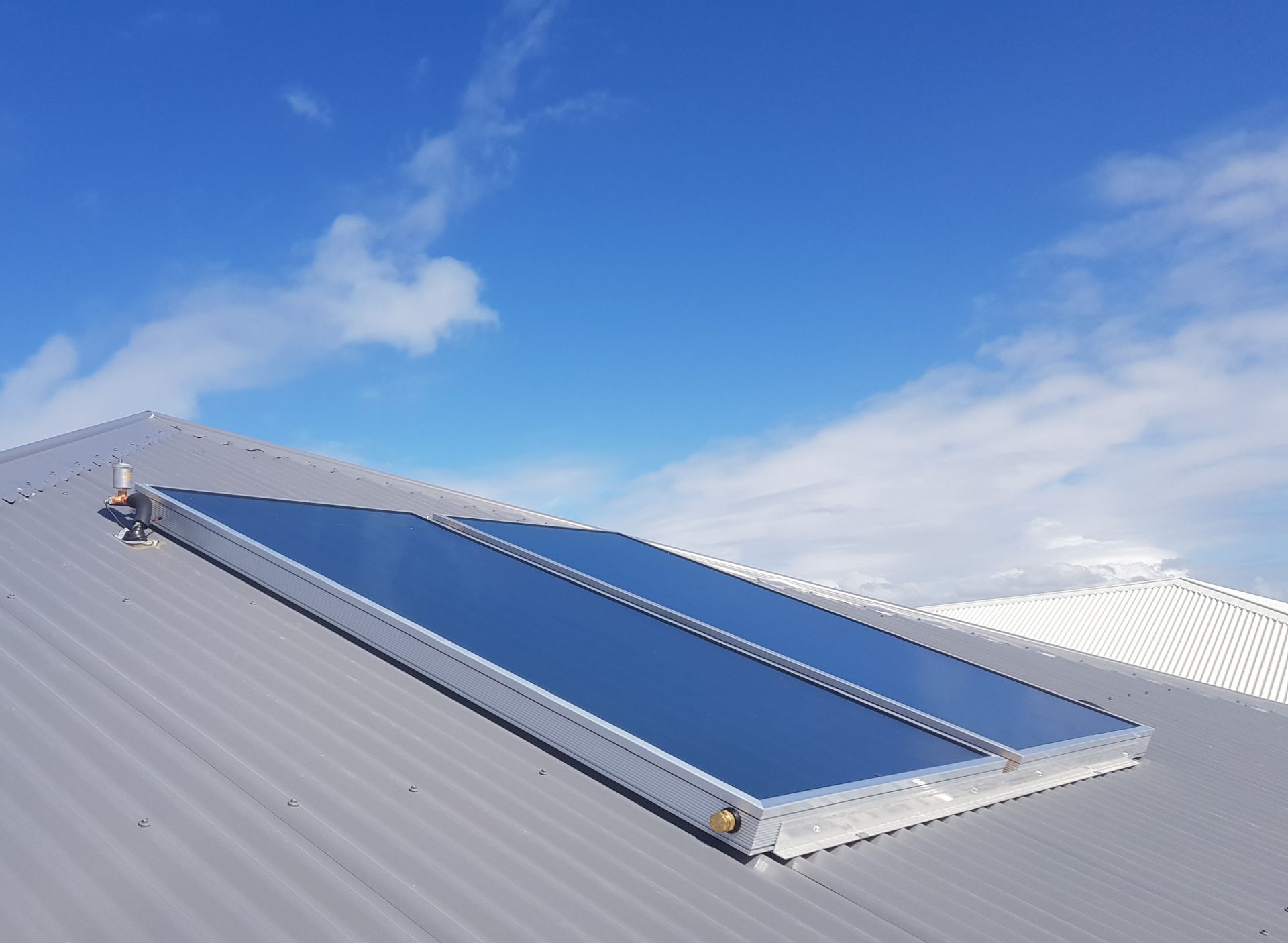 A Roof with A Lot of Solar Panels on It — 24/7 HOT H2O in Valdora, QLD