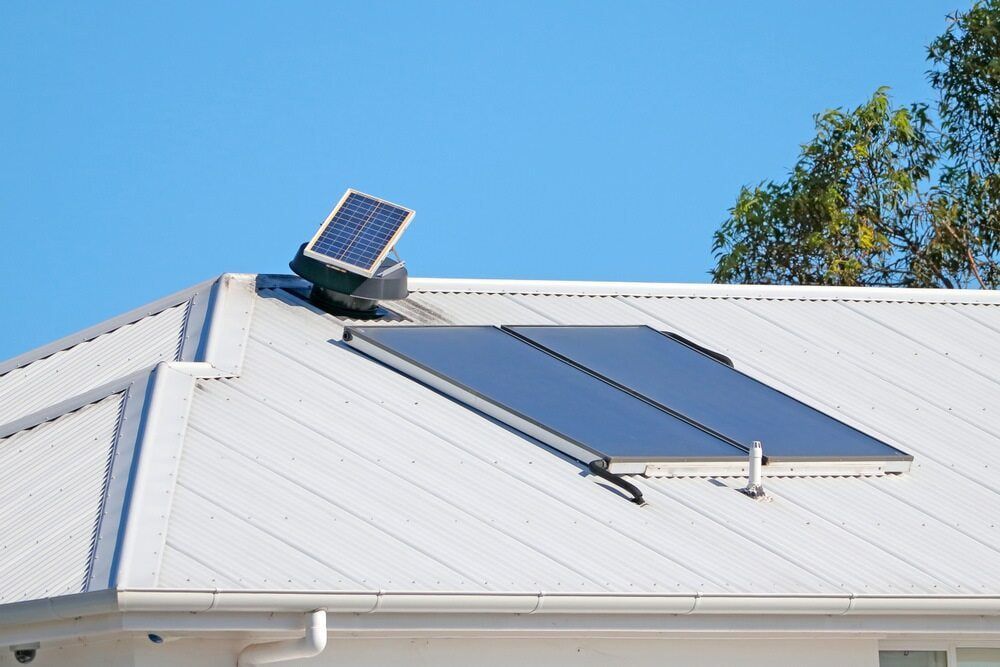 A Solar Panel Is on The Roof of A House — 24/7 HOT H2O in Peregian Springs, QLD