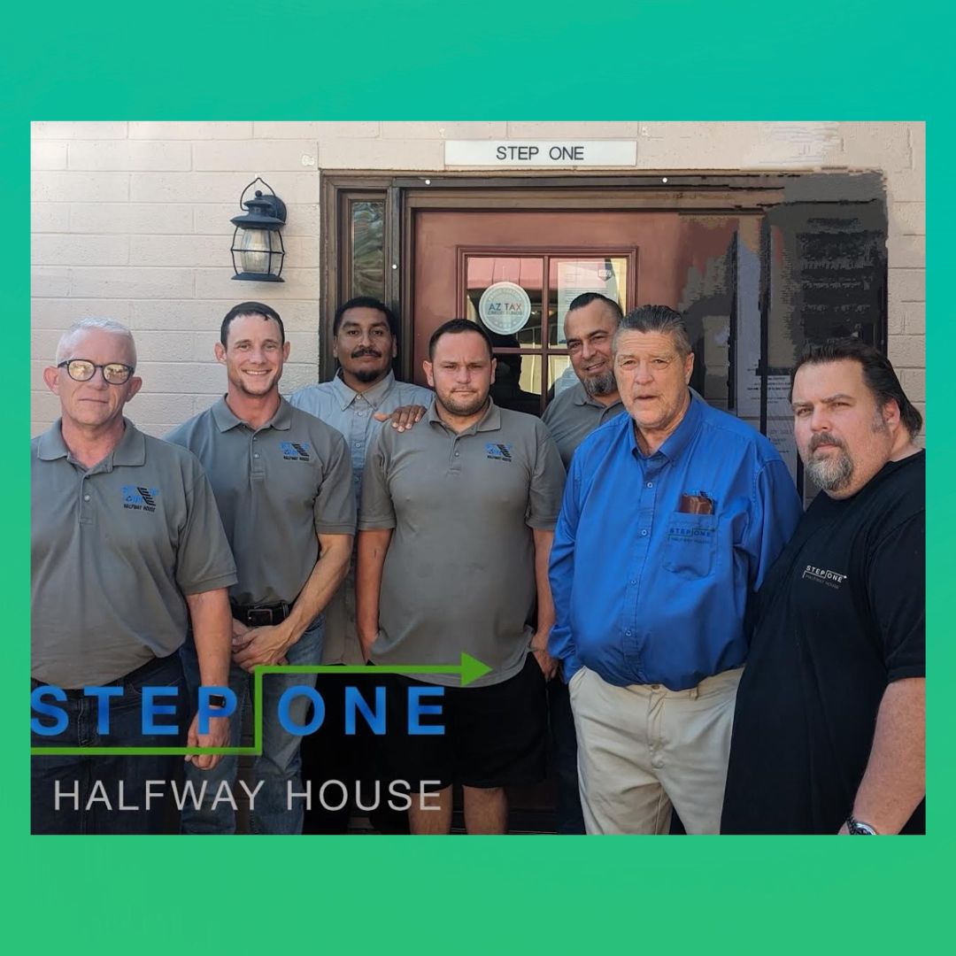 Group of men in front of a building,