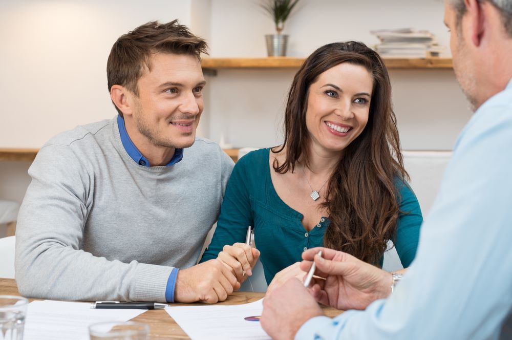 A Man and a Woman Discussing the Financial Challenges — Repo Busters Wyong In Lake Macquarie, NSW