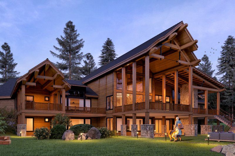 A large white house with a swimming pool in the backyard.